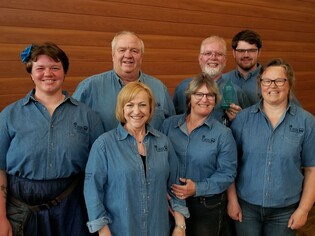 Wolf Creek team left to right: Jeana Freerksen, Jerry Witvoet, Betty Clark, Sheila Talbott, Dodo Freerksen, Brendon Freerksen, Tammy Freerksen.