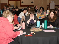 Teachers and school staff discuss strategies to reduce visual clutter and anxiety in the classroom—key adaptations that support students with cerebral visual impairments—at a March 18 session at the Lacombe Memorial Centre.