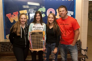 Bronze medalists Elsie Stoupetrigg, Caleigh Stauffer, Emiliey Korman and coach/assistant principal Adrian Paolinelli.