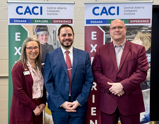 Alberta Education Minister Demetrios Nicolaides meets with Wolf Creek Public Schools Board Chair Luci Henry and Superintendent Tim De Ruyck during the ribbon-cutting celebration at Olds College on April 2, 2025.